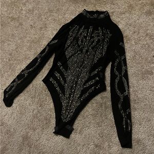 Black mesh long sleeve bodysuit with gold and silver rhinestones. Size large.